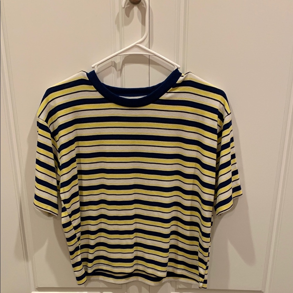 yellow, navy blue, white and black tee